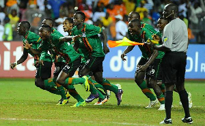 Players of Zambia celebrating their AFCON triumph in 2012