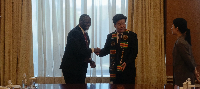 Emmanuel Armah-Kofi Buah with China's Vice Minister for Natural Resources in Tianjin