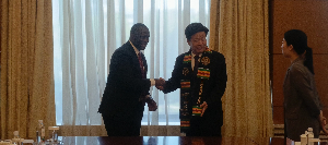 Emmanuel Armah-Kofi Buah with China's Vice Minister for Natural Resources in Tianjin