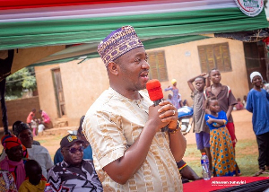 Alhaji Alhassan Suhuyini speaking at the ceremony