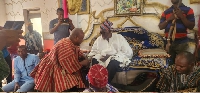 Former President John Dramani Mahama greeting Bolewura Sarfo Kutuge Feso (I)