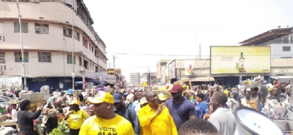 Mr Alan Kyerematen being cheered durring his tour at Makola