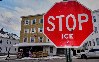 Anti-ICE sentiment is expressed on a traffic sign, Friday, January 23, 2026, in Biddeford, Maine