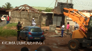 Asembly demolishing the shrine in a waterway