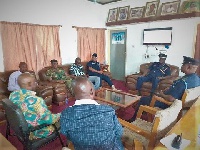 DCOP Francis Doku (2nd R) in a crisis meeting with members of the security council in KpandO