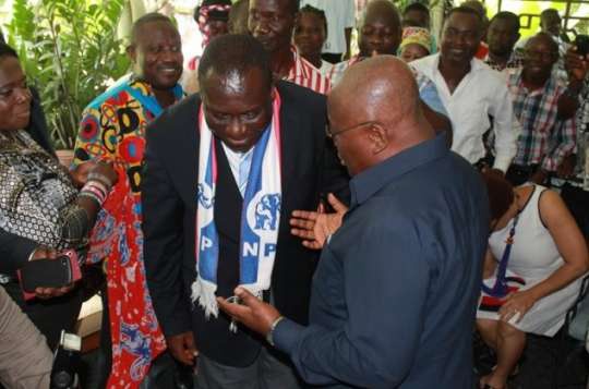Vincent Sowah Odotei (left) interacts with opposition leader Akufo-Addo