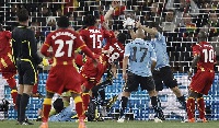 Luiz Suarez palmed the ball from entering the post