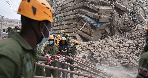 Security forces and civil defense work after a multi-story building collapsed in Nairobi Security forces and civil defense work after a multi-story building collapsed in Nairobi