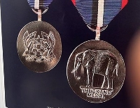 Front and back of the The Grand Medal