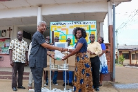Members of the District Grand Lodge of Ghana (English Constitution) donating to the Anyako Community