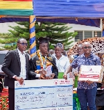 Adjei Ransford Yaw was presented with a cheque  laptop each, and a commemorative plaque.