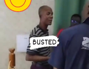 The suspected thief is caught red-handed by some of the church members