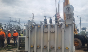 Some men are seen at the Akwatia ECG Bulk Supply Point