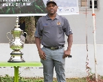 Mr Appiah in a pose with the trophy at stake