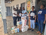 The Bryan Kwabena Osei Baah Memorial Foundation presenting the essential items to the facility