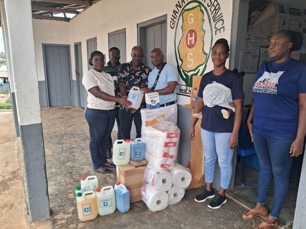 The Bryan Kwabena Osei Baah Memorial Foundation presenting the essential items to the facility
