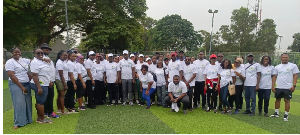 Minister in a group photo with participants