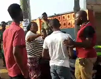 Image of voters Sowutuom Chop Bar polling station