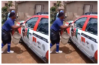 NPP supporters washing a campaign vehicle of the NDC Parliamentary candidate