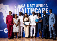 The team from the Greater Accra Regional Hospital with a display of their award