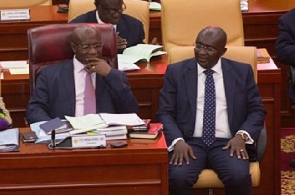 Osei Kyei-Mensah-Bonsu (left) with Dr Mahamudu Bawumia on the floor of parliament