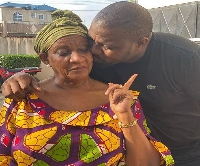 Actor John Dumelo and mother. Photo via Instagram