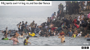 Many young men were seen swimming into Ceuta or crossing the land border