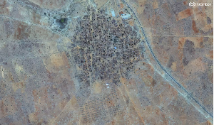 A satellite image shows a closer view of Garney village after new temporary shelters were set up