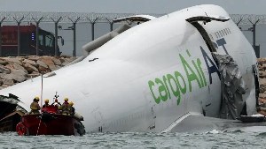 The cargo plane reportedly hit a vehicle