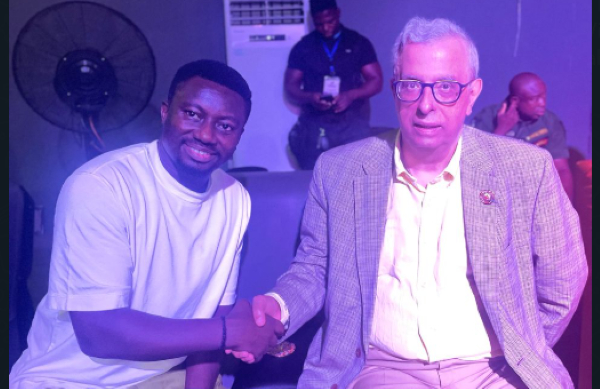 Isaac Adu Amankwaah with one of the partners