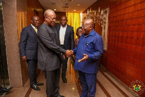John Mahama shaking hands with Akufo-Addo at the Jubilee house