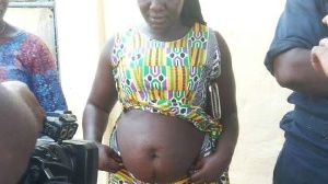 File photo of a woman heavily pregnant with belly protruding