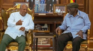President John Mahama in an interaction with former President Kufour