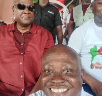 Dr William Atta Owusu in a picture with President John Dramani Mahama