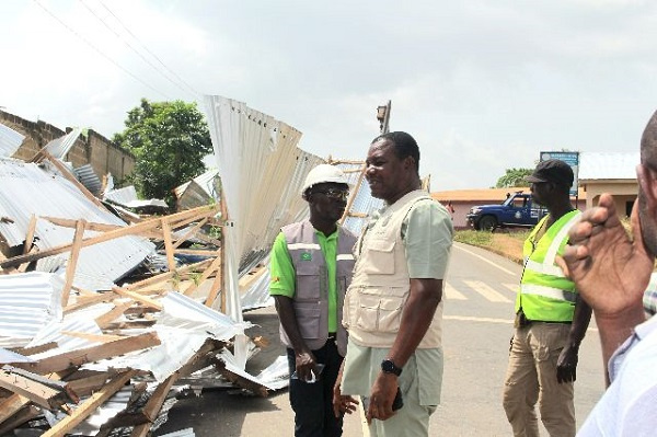 Obuasi MCE and contractors at demolishing site