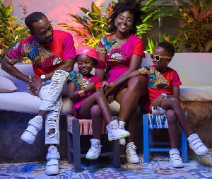 Okyeame Kwame with his wife and children