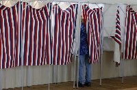 Voters cast ballots in New Hampshire’s primary ahead of the November midterms