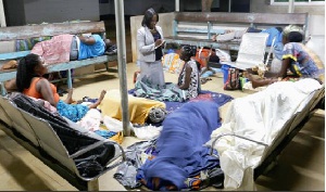 File photo of patients on the floor of a hospital due to unavailability of beds