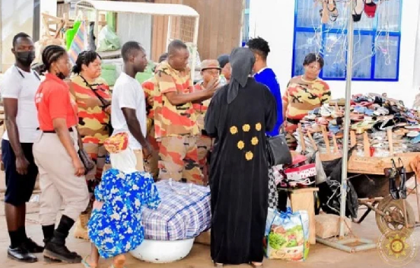 Fire service personnel seen speaking to  traders