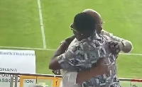 Former Black Stars captains Andre Ayew embracing Asamoah Gyan