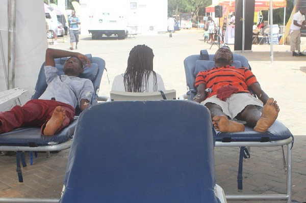 People donating blood