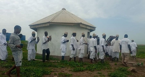 Young maidens, traditional leaders, priests, and priestesses gathered