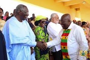 An old picture of President Nana Akufo-Addo (R) shaking hands with ex-President John Agyekum Kufuor