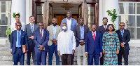 Yoweri Kaguta Museveni in a group photiograph with officials of Jospong Group of Companies in Uganda