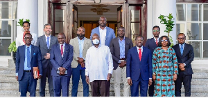 Yoweri Kaguta Museveni in a group photiograph with officials of Jospong Group of Companies in Uganda