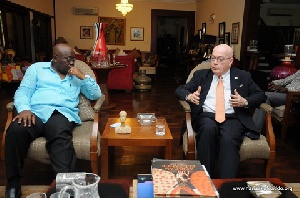 Nana Akufo-Addo interacting with the US ambassador Robert Porter Jackson