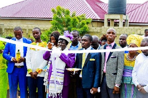 Apostle Bishop Grace Nkuah Mensah being assisted to open the Bethel Temple