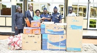 Theodosia Jackson, principal of the school handing over the items to the police administration