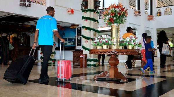 Guests arrive at a Beach Resort in Mombasa, Kenya
