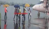 Passengers who disembarked had to walk about 100 metres in the rain to get to the arrival hall